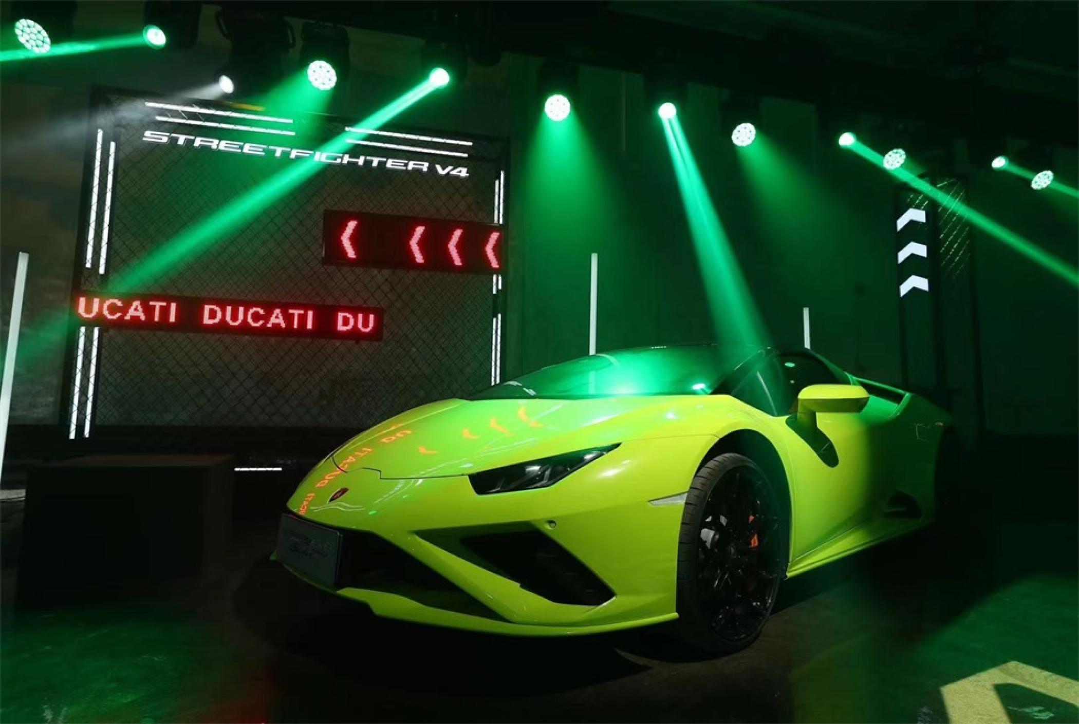 杜卡迪和兰博基尼上市慈善拍卖活动策划创造了一个类似机库的地下氛围